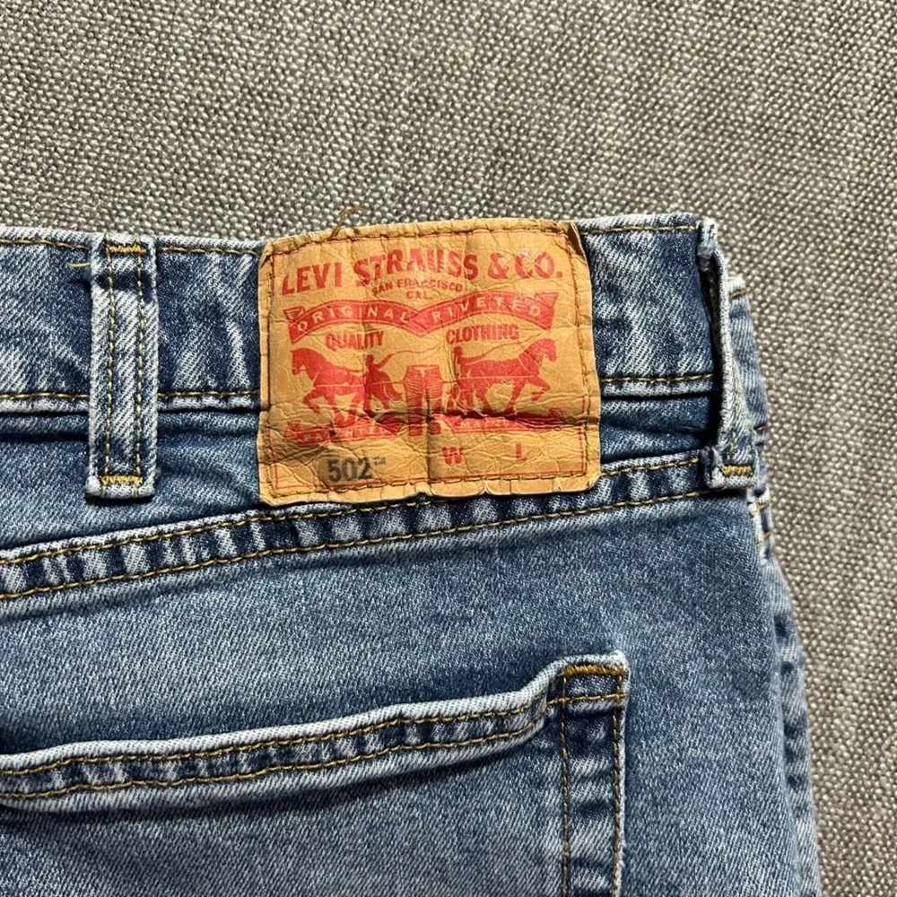 Levi's 502 Taper Jeans Mens 44x28 Blue Medium Wash Stretch Denim Tapered Leg